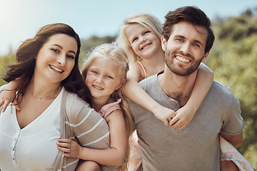 Image showing Park, piggyback and portrait of parents with children enjoying quality time in nature, holiday and weekend. Family, love and happy kids, mom and dad smile for bonding, relax and adventure outdoors