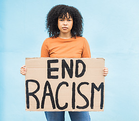 Image showing Black woman protest, sign and anger in portrait, racism and equality, human rights and freedom isolated on blue background. Global problem, social justice and revolution, angry in studio and politics