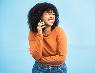 Image showing Laughing black woman, afro and phone call on isolated blue background for funny gossip, comedy news or comic story. Smile, happy and student talking on mobile communication technology by wall mock up