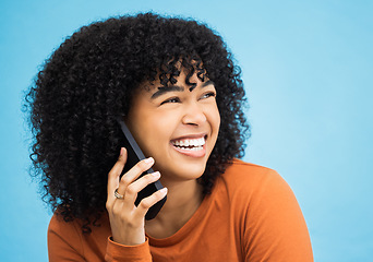 Image showing Laughing black woman, face and phone call by isolated blue background in funny gossip, news and comic story. Smile, afro and happy person talking on mobile communication technology by wall mock up