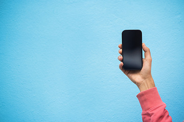 Image showing Person, hand or phone screen mockup on isolated blue background in social media, app or blank web design. Zoom, student or model man with technology mock up for city contact communication or branding