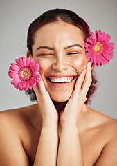 Image showing Natural beauty, flowers and face of happy woman with eco friendly makeup, facial product or floral skincare glow. Sustainable cosmetics, spa salon girl and model smile isolated on studio background