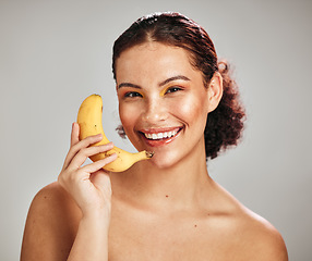 Image showing Beauty, face portrait and woman with banana phone call for facial skincare glow, fruit detox or natural makeup. Wellness health product, nutritionist food or happy model isolated on studio background