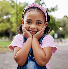 Image showing Cute little girl, face and portrait smile in adorable pink casual fashion with denim at the outdoor park. Happy girly child smiling in happiness with innocent expression for holiday break in nature