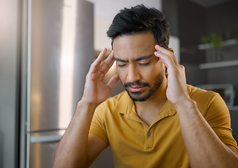 Image showing Businessman, home office and stress headache in kitchen for mindset focus, mental health and work fatigue. Digital entrepreneur thinking, business owner and anxiety in house, tired and frustrated