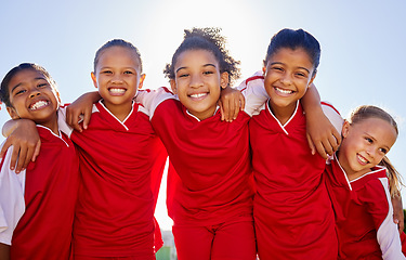 Image showing Group portrait, girl football and field with smile, team building motivation or solidarity at sport training. Female kids, sports diversity and happy with friends, teamwork or development for soccer