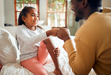 Image showing Black family, father and girl fist bump for love, bonding or care in bedroom. Hands gesture, unity and happy kid and man with fists sign for support, union or trust, solidarity and affection in house