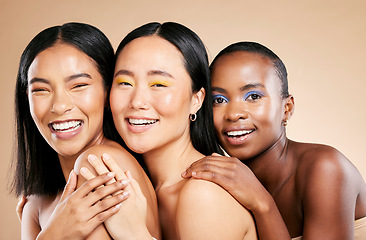 Image showing Makeup, diversity and woman happiness together for support, facial wellness and cosmetics dermatology care in brown background studio. Model, smile and interracial beauty inclusion with skin glow