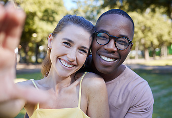 Image showing Love, smile and selfie with interracial couple at park for relax, social media and peace on romantic date. Support, happy and quality time with black man and woman for bonding, calm and vacation