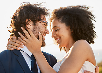 Image showing Wedding, hug and marriage of a interracial couple in nature happy about trust and commitment. Outdoor marriage, sea and mock up with happiness and smile of bride and man in a suit at a event