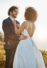 Image showing Wedding, nature and couple on mountain for marriage ceremony, commitment and celebration. Trust, love and interracial bride and groom loving, happy and smile ready for romance, bonding and affection