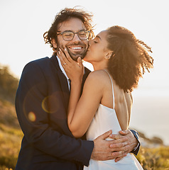 Image showing Love, kiss and wedding with couple in nature for celebration, happiness and romance. Sunset, hug and affectionate with man and woman in embrace at countryside for happy, marriage and smile together