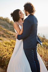 Image showing Wedding couple, interracial and hug in nature, happy and excited while celebrating love, beginning and romance. Romantic, marriage and black woman bride with groom embrace, cheerful and smile