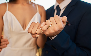 Image showing Love, wedding or hands of a couple promise trust, support or commitment in a romantic celebration event. Interracial marriage. Zoom, black woman and man together as bride and groom in a partnership