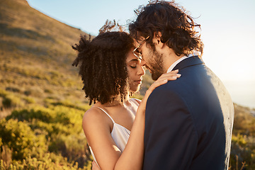 Image showing Wedding, interracial couple hug and mountains of people outdoor in nature for marriage and save the date. Trust, love celebration and bride with man for commitment, care and feeling calm together