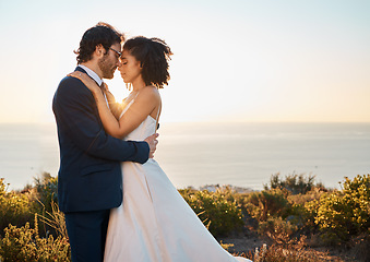 Image showing Love, bride and groom on mountain for wedding celebration, marriage ceremony and commitment. Trust, happy and interracial couple bonding, intimate and calm on romantic holiday, honeymoon and vacation