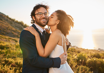 Image showing Love, kiss and wedding with couple in nature for celebration, happiness and romance. Sunset, hug and affectionate with man and woman in embrace at countryside for happy, marriage and smile together