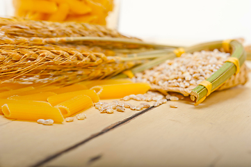 Image showing Italian pasta penne with wheat