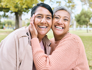 Image showing Retirement hug, portrait or bonding women in nature park, grass garden or relax environment in profile picture or social media. Smile, happy or senior couple of friends in embrace for birthday pride