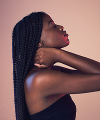 Image showing Black woman profile, face and braids with eyes closed, makeup and beauty isolated on studio background. Natural cosmetics, hair and hairstyle with cosmetic care, wellness and African model is content