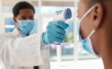 Image showing Doctor, patient and Covid, healthcare and thermometer for temperature check zoom with black people in medicine. Face mask, Corona and virus prevention, man and woman in clinic for medical screening