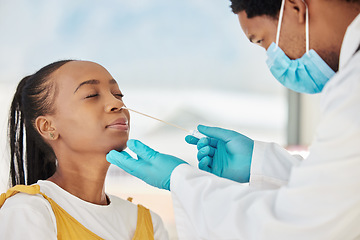 Image showing Doctor, patient or covid nose test in hospital checkup, clinic wellness or bacteria virus control. Black woman, cotton or swab with healthcare worker in disease sample, medical research or compliance