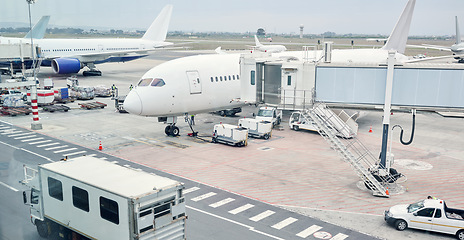 Image showing Airport runway, travel and cargo for airplane for takeoff, international flight and commercial transportation. Air transport, global destination and plane loading baggage, luggage and boarding