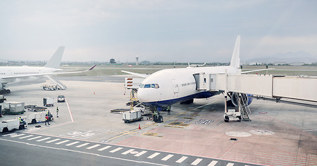 Image showing Travel, airport and airplane on runway for boarding, international flight and commercial transportation. Transport, immigration and plane at terminal for global destination, takeoff and tourism