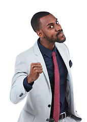 Image showing Fist, angry and portrait of a businessman in a studio with a upset, mad or annoyed face expression. Stress, frustrated and African male model with hand for conflict fight isolated by white background