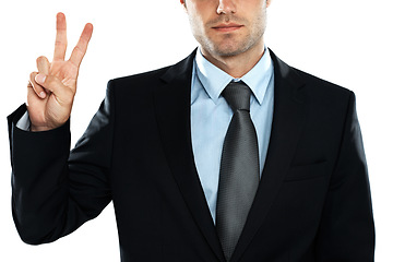 Image showing Hand, peace and businessman in studio, winner and mindset standing on white background space. Peace sign, emoji and young entrepreneur confident about startup, idea and career goal while isolated