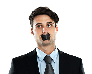 Image showing Business man, tape on lips and corporate silence for secret, privacy and confidential information in studio. Person with mouth covered for censored, scared and hush isolated on a white background