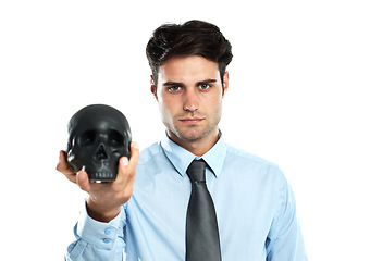 Image showing Portrait, black skull and hand of businessman in studio for magic and spooky on white background. Research, human and head by young male thinking, planning and vision for abstract goal while isolated