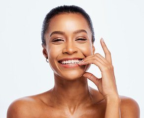 Image showing Portrait, beauty and dental with a model black woman in studio isolated on a white background for oral hygiene. Face, skincare and teeth with an attractive young female posing on blank space