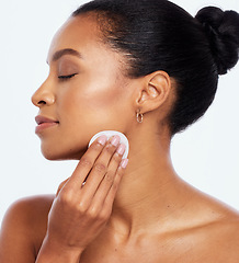 Image showing Beauty, skincare and cotton for face cleaning in studio with dermatology cosmetics for natural skin. Aesthetic model person with spa facial and healthy detox glow isolated on a white background