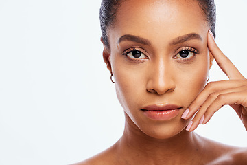 Image showing Black woman, face portrait and beauty in studio, isolated white background and mockup. Serious female model, facial skincare and aesthetic makeup for dermatology, natural cosmetics and salon wellness