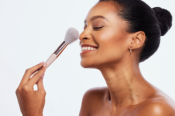 Image showing Beauty, makeup brush and face of a happy woman in studio for dermatology and cosmetics. Aesthetic model person with facial powder tools for healthy skin and shine glow isolated on a white background