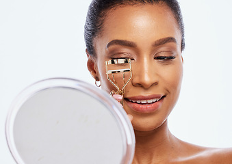 Image showing Makeup, beauty and eyelash curler by black woman doing self care or skincare isolated against a studio white background. Happy, cosmetics and face of female model holding product or tool