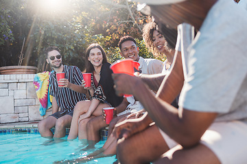 Image showing Vacation, drinks and friends speaking in a pool at a summer party, celebration or event at a home. Diversity, happy and people talking, having fun and bonding by the swimming pool while drinking.
