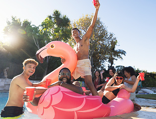 Image showing Pool party, beer and friends on flamingo, having fun and partying. Summer celebration, water event and group portrait of drunk funny people laughing with alcohol, swimming and floating on bird float.