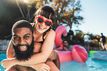 Image showing Love, pool party and couple piggyback, having fun and bonding. Swimming, romance diversity and portrait of happy man carrying woman in water and laughing at funny joke at summer event or celebration.