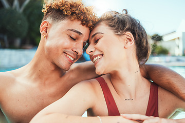 Image showing Party, pool and diversity with a couple of friends swimming outdoor together during summer. Love, water and swim with a young man and woman swimmer enjoying a birthday or celebration event