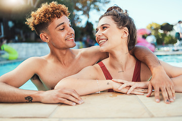 Image showing Party, swimming and diversity with a couple of friends in the pool outdoor together during summer. Love, water and swim with a young man and woman swimmer enjoying a birthday or celebration event