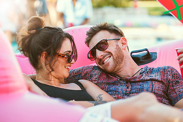 Image showing Happy, relax and couple talking at a party, conversation and holiday together in summer. Drinks, smile and man and woman in communication at a pool social to celebrate, have fun and vacation in Bali