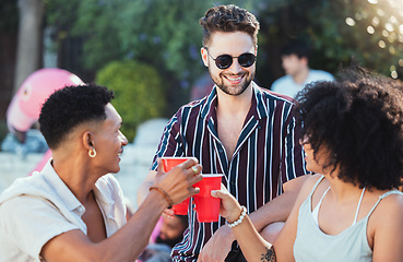 Image showing Party, diversity and cheers with friends outdoor together in summer for a social gathering or celebration event. Alcohol, toast or birthday with a young man and woman friend group celebrating outside