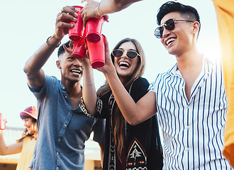 Image showing Party, drinks and cheers with friends outdoor to celebrate at festival, happy hour or summer social event. Diversity young men and women people together for toast, happiness and drinking alcohol