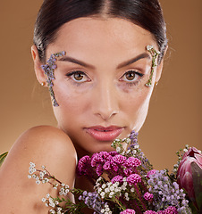 Image showing Floral beauty, flower bouquet and face of woman with eco friendly cosmetics, natural facial product or lavender skincare. Dermatology, spa salon and aesthetic model portrait with sustainable makeup