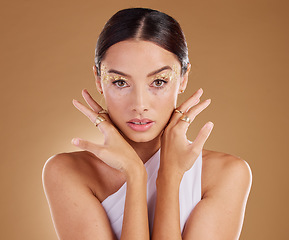 Image showing Gold portrait, glitter makeup or woman with luxury eyeshadow, cosmetics product and skincare glow. Beauty girl, spa salon or aesthetic model face with jewelry ring, accessories or vitiligo healthcare