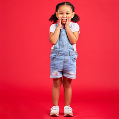 Image showing Happy, youth and portrait of girl on red background for happy childhood, positive mindset and smile. Fashion, summer style and cute face of girl in studio with funny, comic and meme facial expression