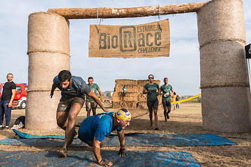 Image showing Athletes crossing the finish line