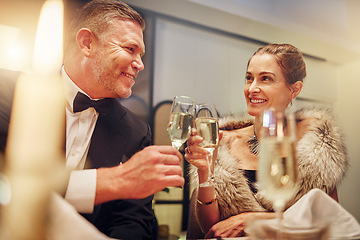 Image showing Success, love or happy couple toast in a party in celebration of goals or new year at luxury event. Motivation, congratulations or people cheers with champagne drinks or wine glasses at dinner gala